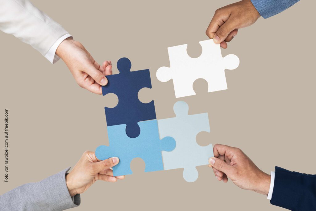 Kooperation - jedes Puzzleteil führt zum Erfolg
